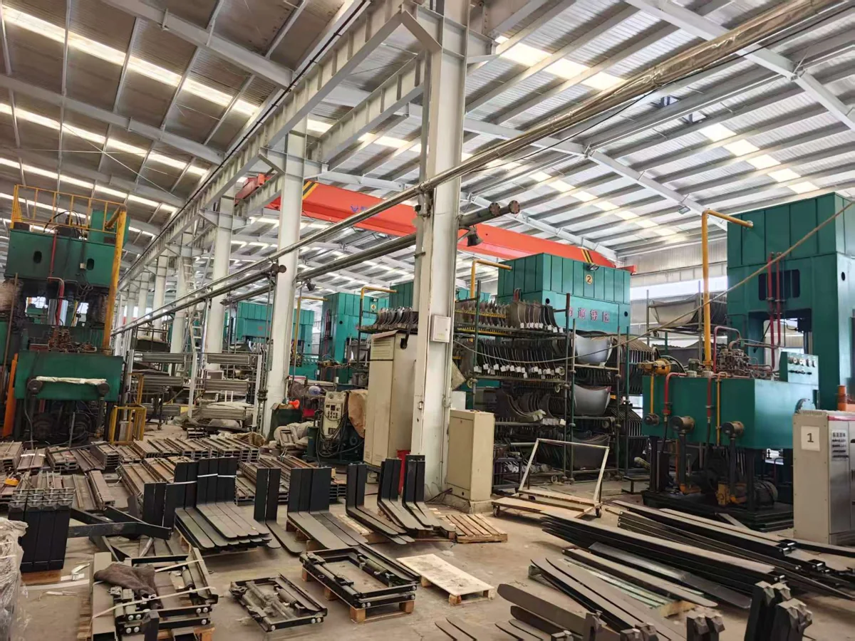 Industrial equipment inside a supplier workshop shown in user-supplied reference material